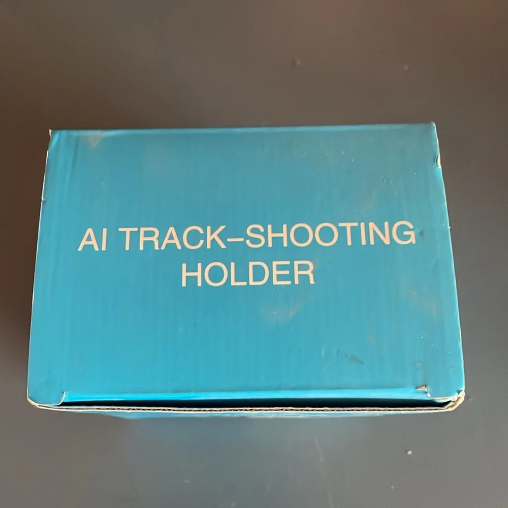 Photo tracking phone holder